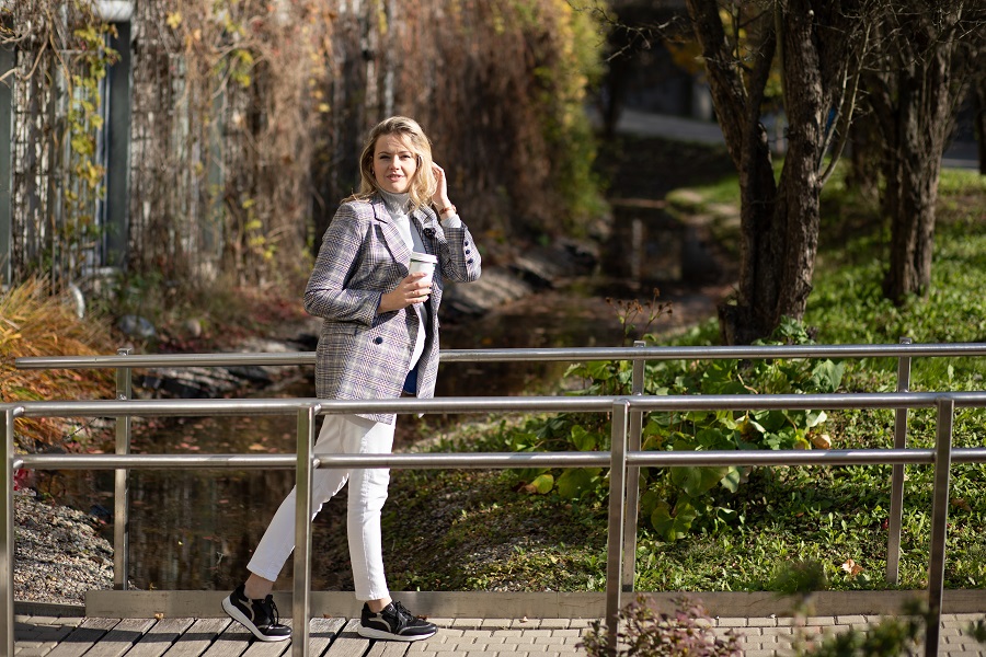 woman mindfully walking in park without stress