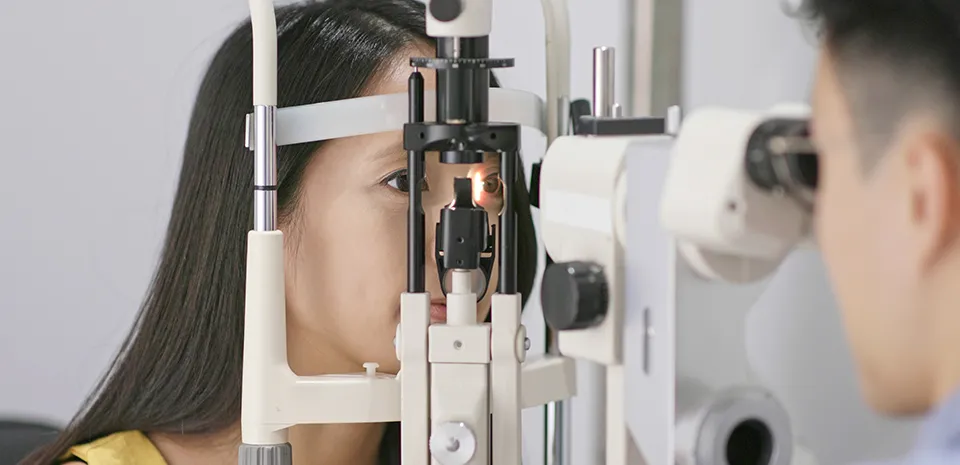 Image of woman getting eye exam