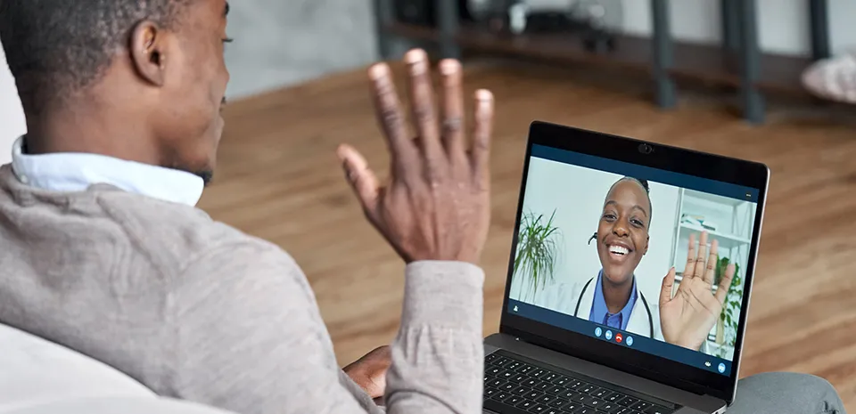 Image of caregiver doing a virtual appointment with a patient