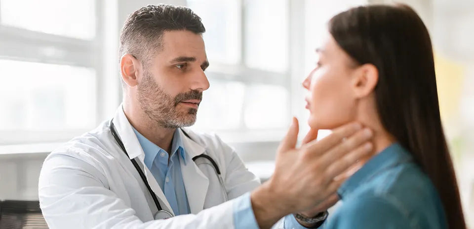 Image of doctor examining a patient