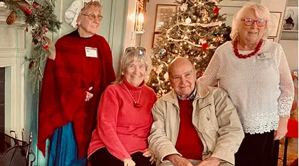 Marlborough Historical Society members enjoying cozy fires and lighted Christmas trees.