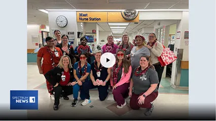 Caregivers at UMass Memorial Medical Center wear red for National Wear Red Day Friday.