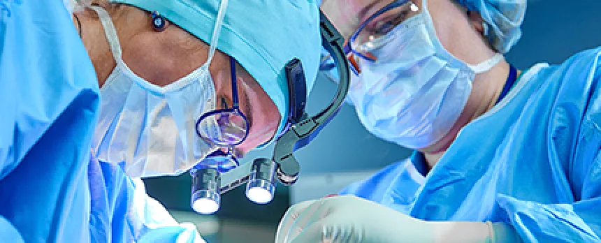 Image of two surgeons in a procedure